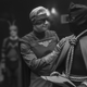 Captain Metropolis and Hooded Justice at a Minutemen press conference.